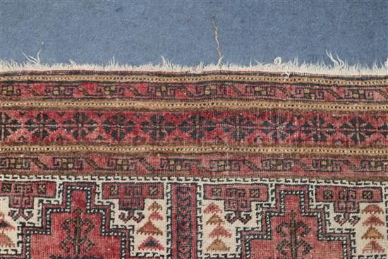 A Tekke Bokhara rug and a similar smaller rug 200 x 128cm and 165 x 95cm